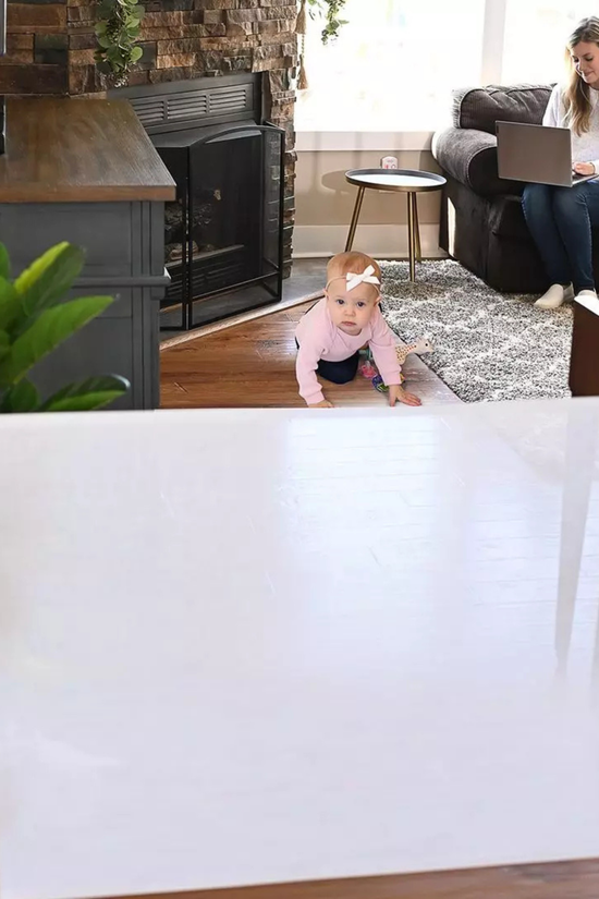 Puerta Retráctil de Seguridad para Bebés Momcozy