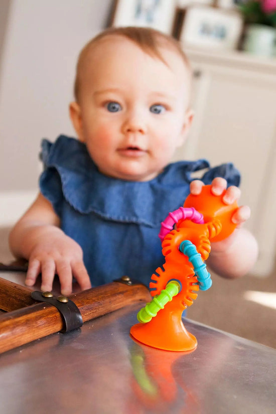 Mordedor y Sonajero PipSquigz loops Fat Brain Toys